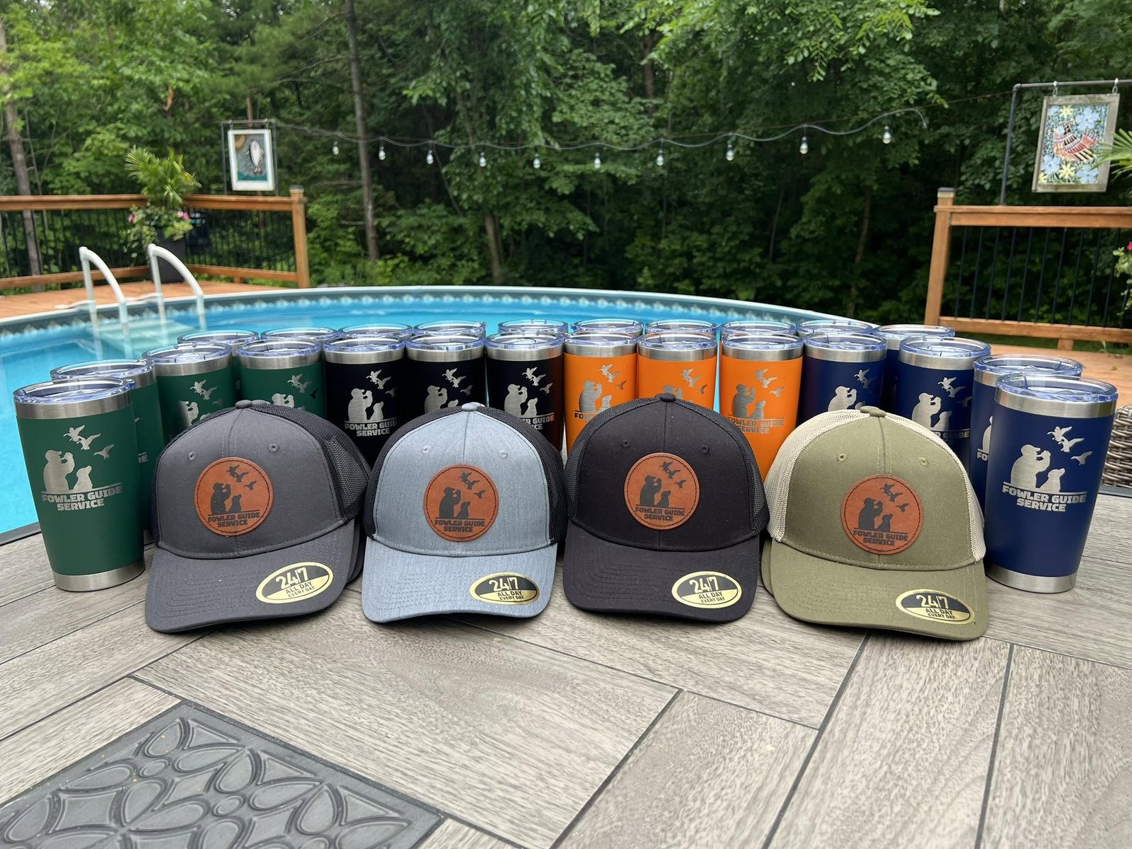Leather patch hats and engraved tumblers for Fowler Guide Service